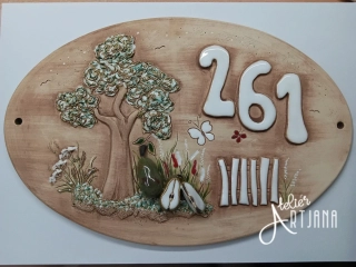 Cedulka s číslem a hruškami